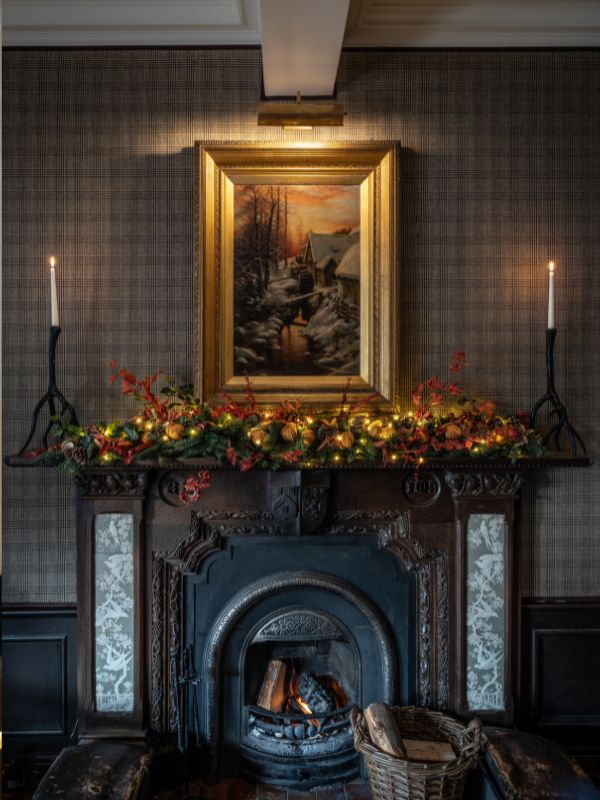 Artwork above the fireplace in the snug of the Flying Stag